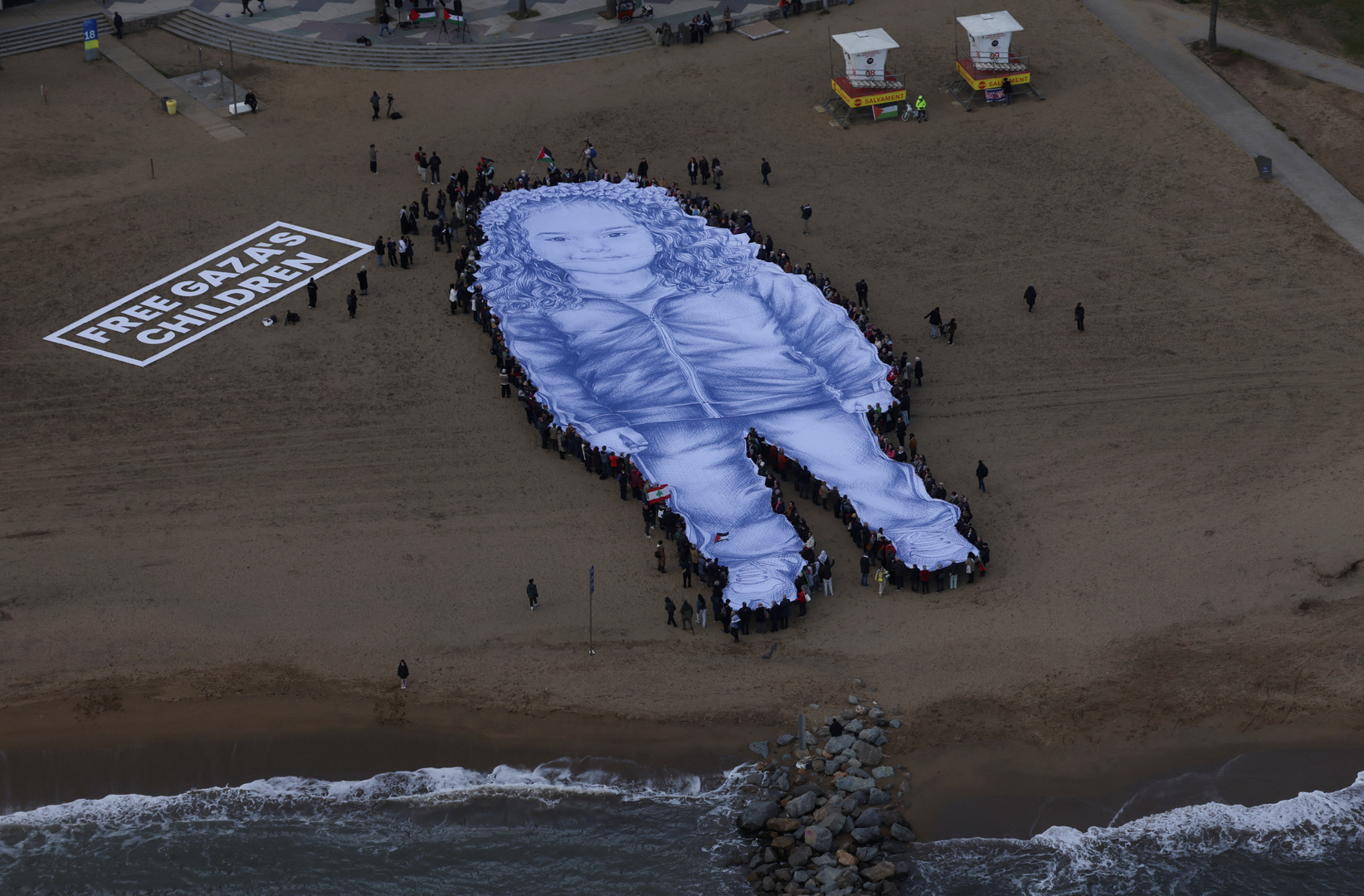 Barcelona Activists Unveil Giant Portrait Marking Two Years Since Hind Rajab's Death