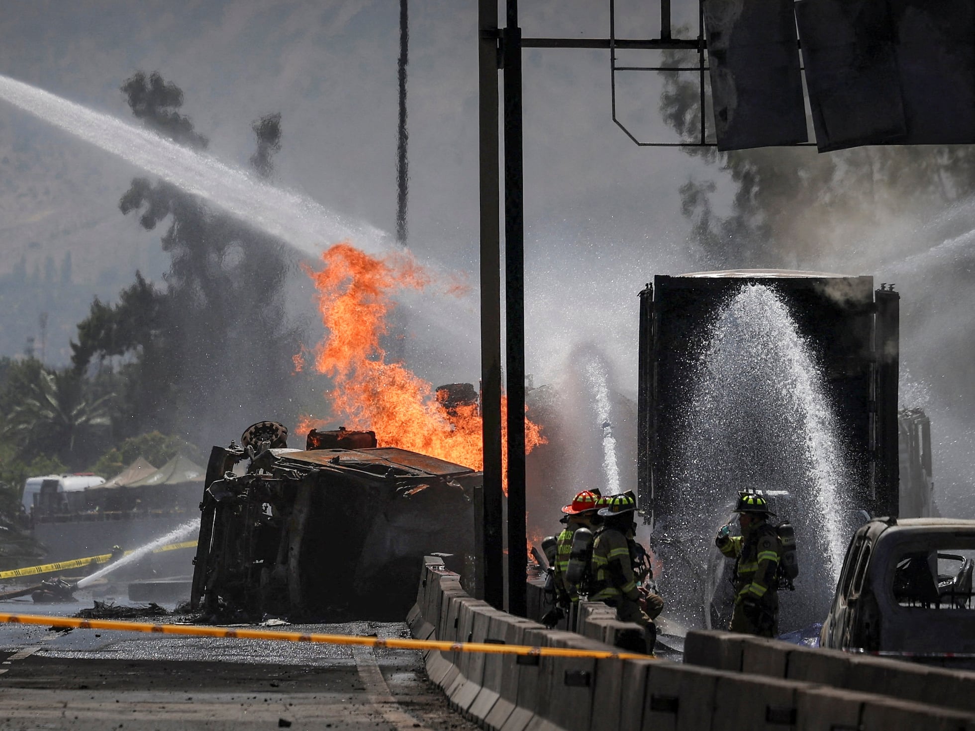 Emergency response scene following the gas truck explosion in Renca.